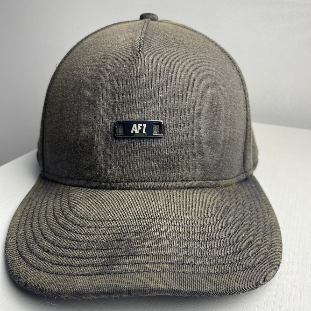 Brown Nike Air Force 1 True snapback hat with front metal AF1 logo plaque