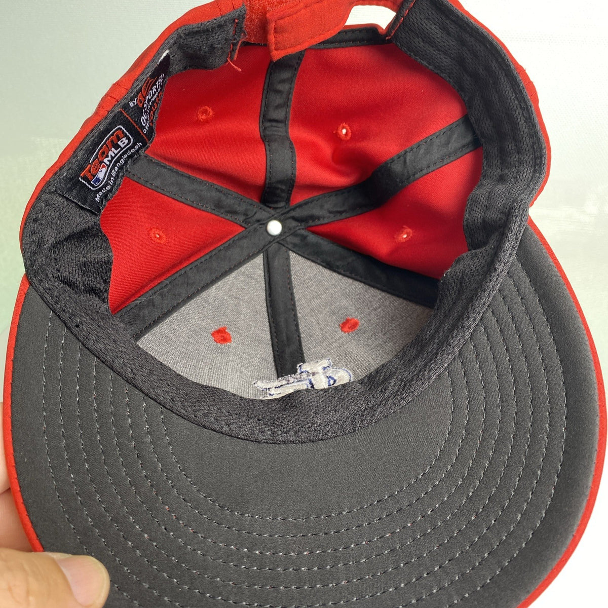 St. Louis Cardinals red MLB baseball cap with raised embroidered STL logo and adjustable strap