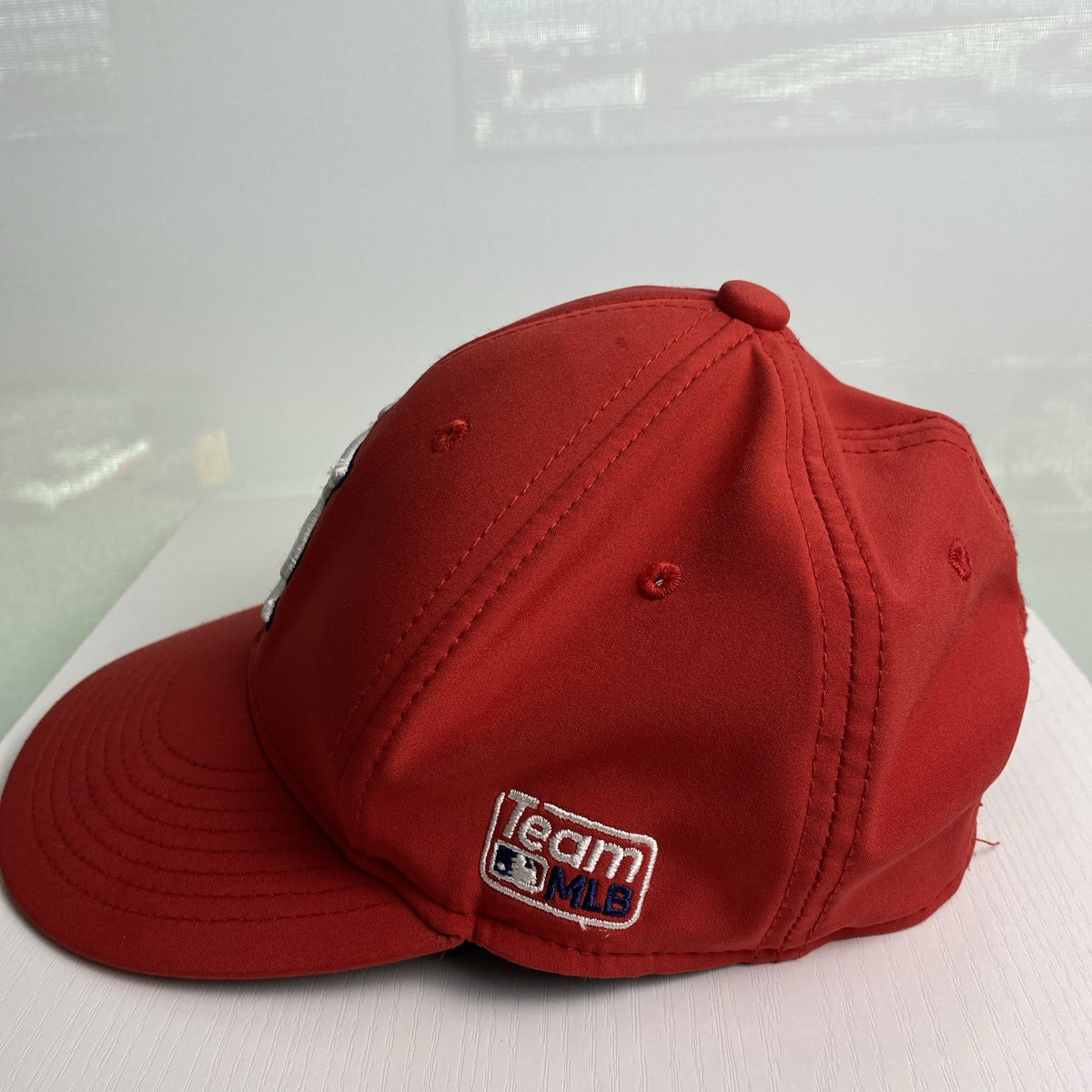 St. Louis Cardinals red MLB baseball cap with raised embroidered STL logo and adjustable strap
