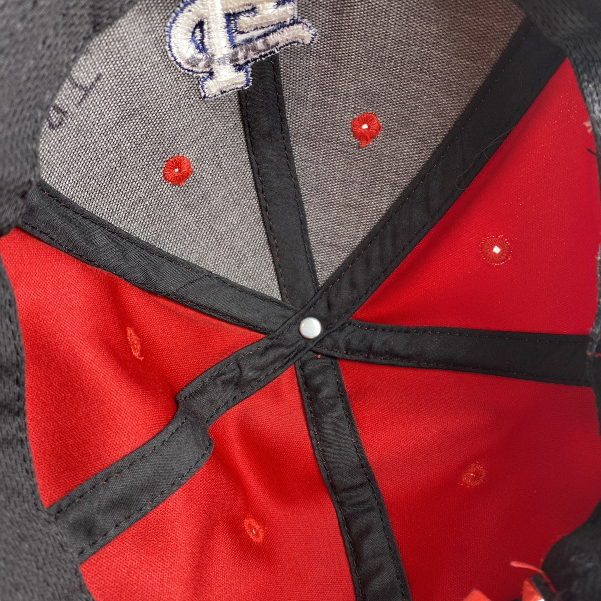 St. Louis Cardinals red MLB baseball cap with raised embroidered STL logo and adjustable strap