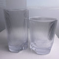 Set of four Schott Zwiesel Bar Selection Fave clear fluted glass tumbler drinking glasses.