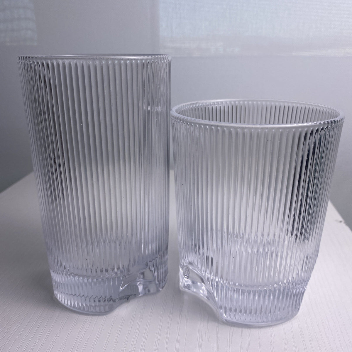 Set of four Schott Zwiesel Bar Selection Fave clear fluted glass tumbler drinking glasses.