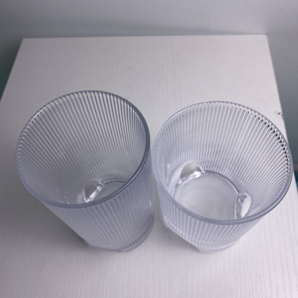 Set of four Schott Zwiesel Bar Selection Fave clear fluted glass tumbler drinking glasses.