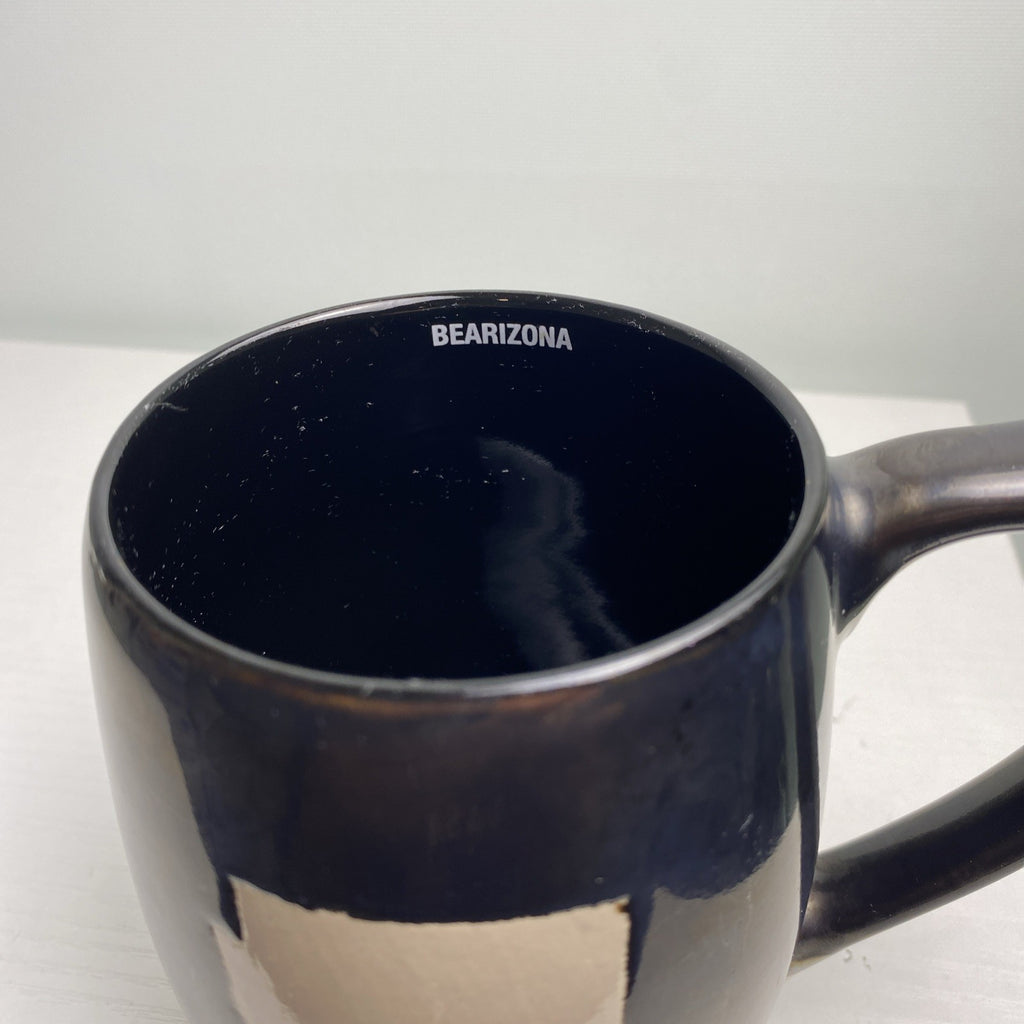 Big Sky Carvers Bearizona stoneware coffee mug with bronze metallic glaze and Arizona map