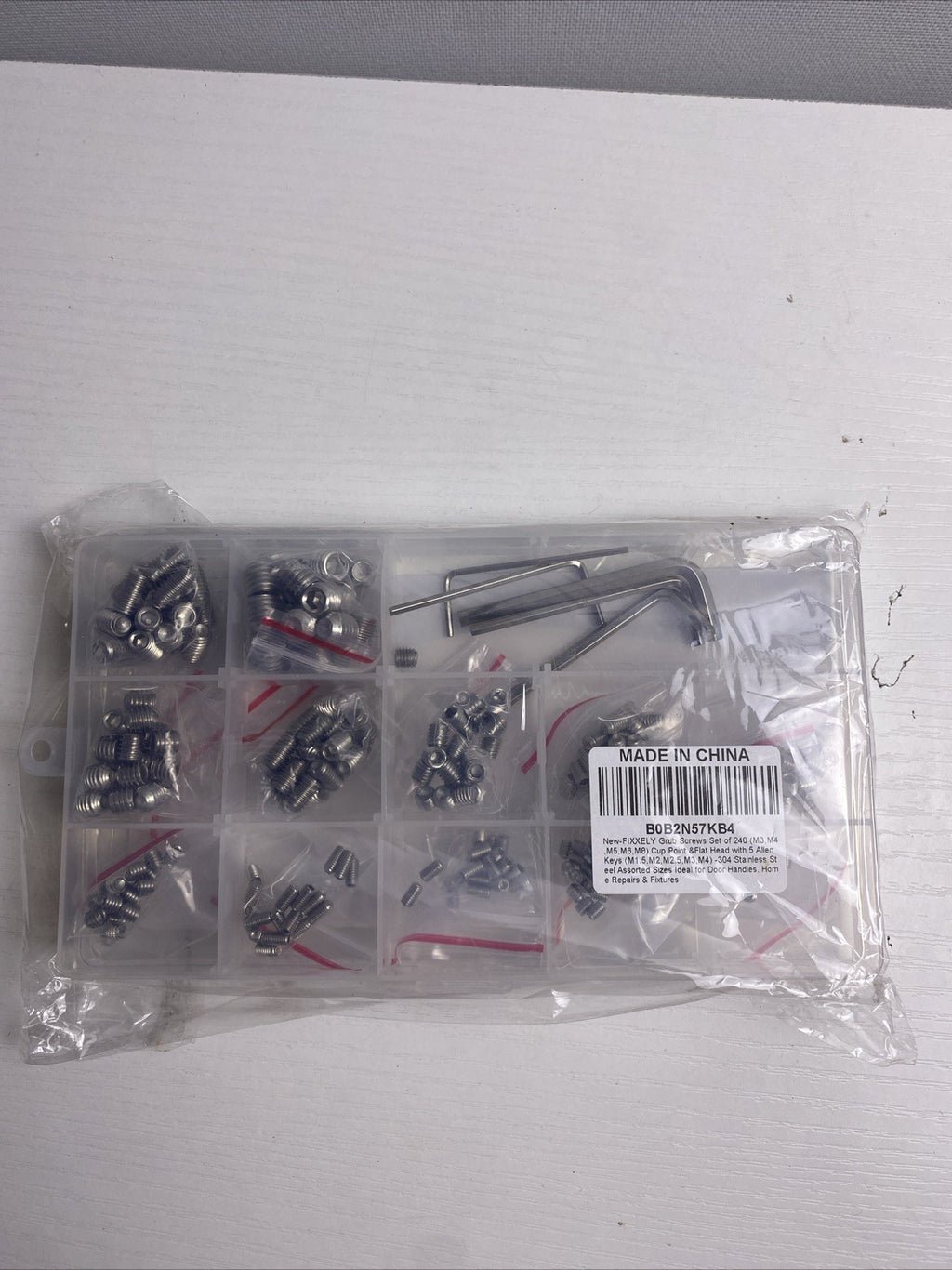 Sealed FIXXELY 240-piece 304 stainless steel metric hex socket grub screw kit in clear organizer case