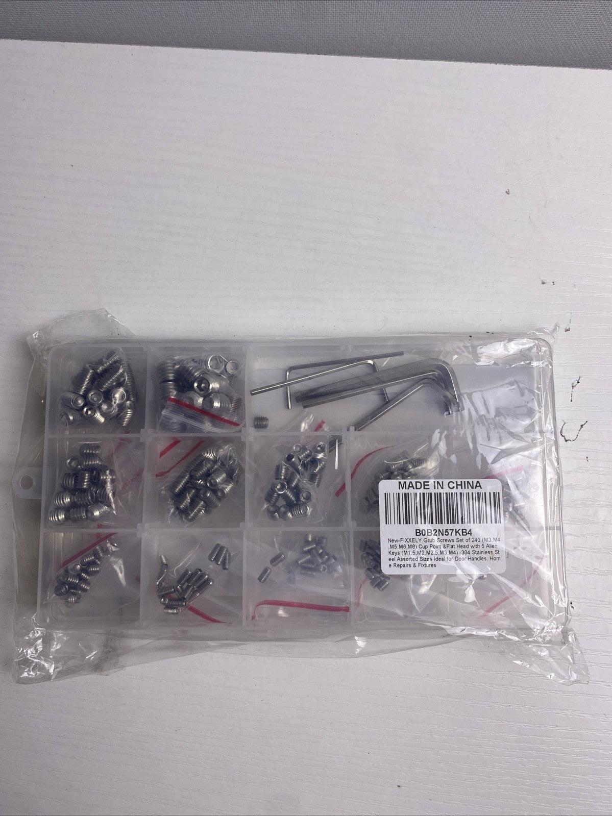 Sealed FIXXELY 240-piece 304 stainless steel metric hex socket grub screw kit in clear organizer case