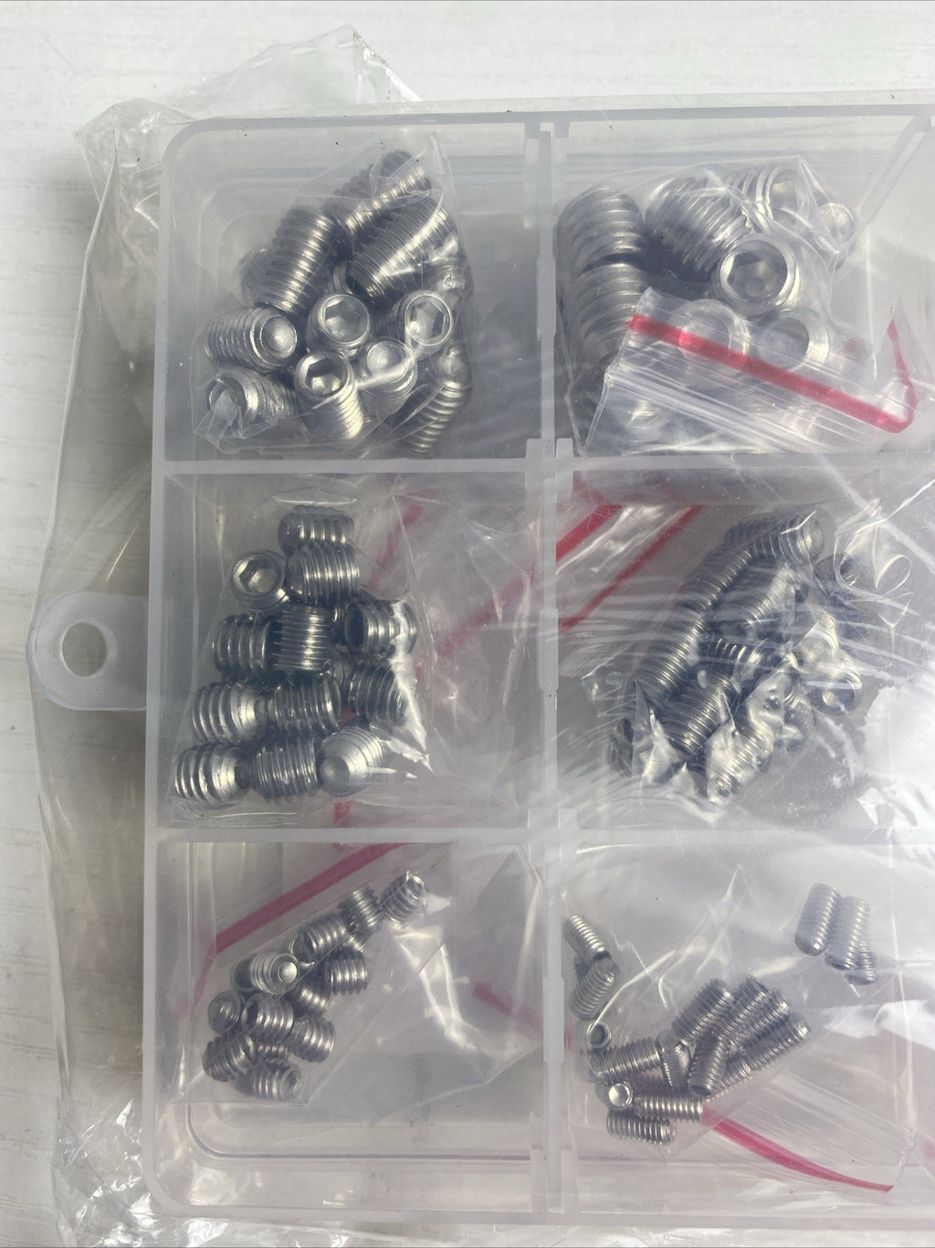 Sealed FIXXELY 240-piece 304 stainless steel metric hex socket grub screw kit in clear organizer case