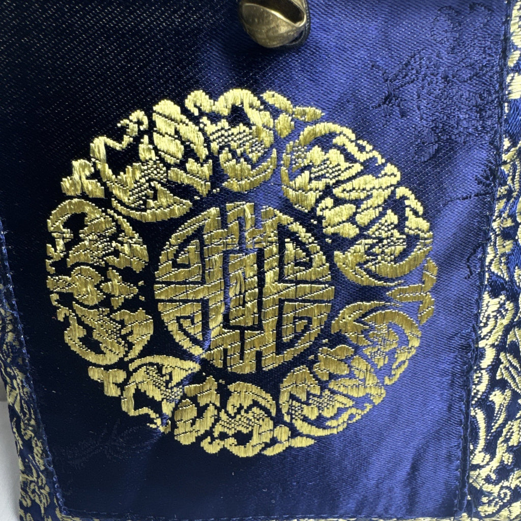 Chinese cobalt blue and gold silk brocade neck pouch featuring a Shou longevity medallion and brass bell toggle