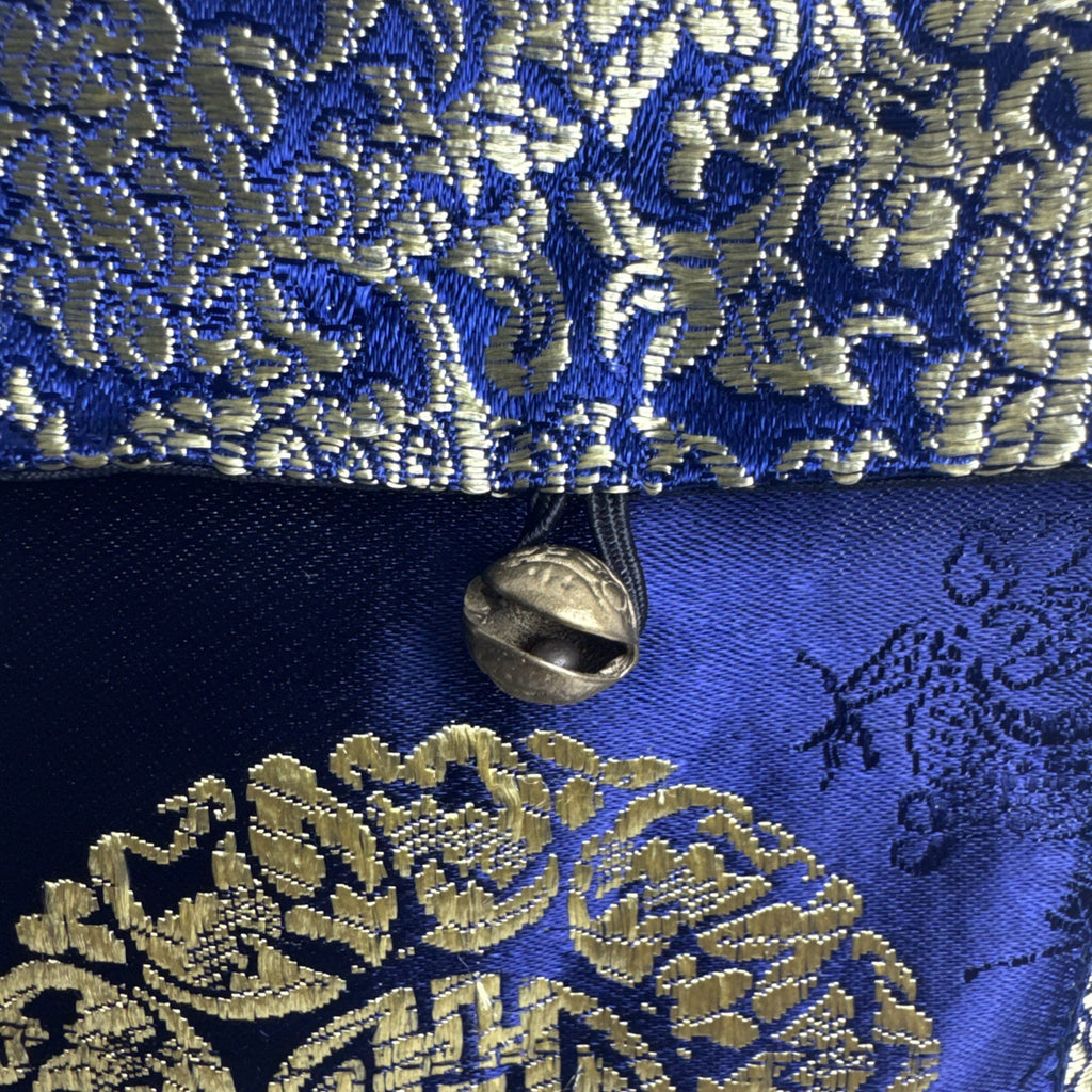 Chinese cobalt blue and gold silk brocade neck pouch featuring a Shou longevity medallion and brass bell toggle