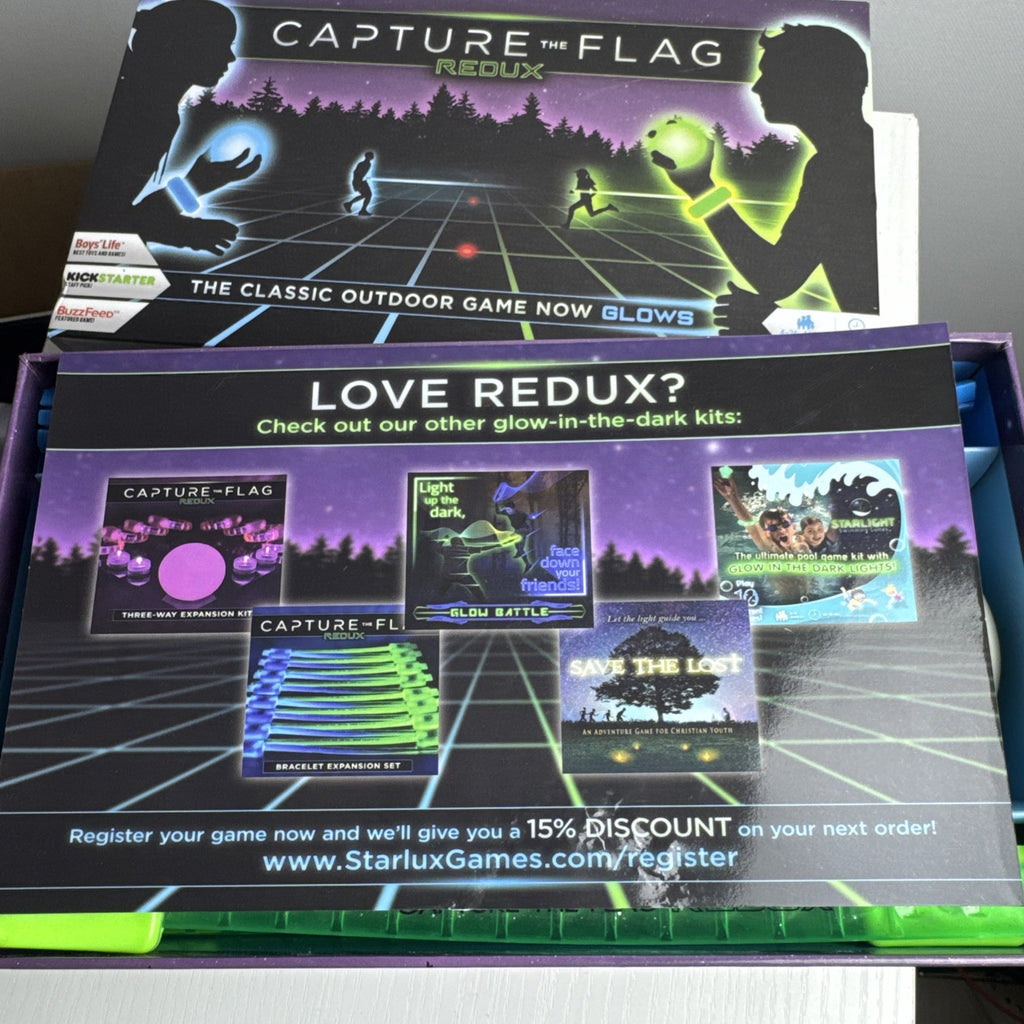 Capture the Flag Redux outdoor LED lawn game set with glowing orbs and box.