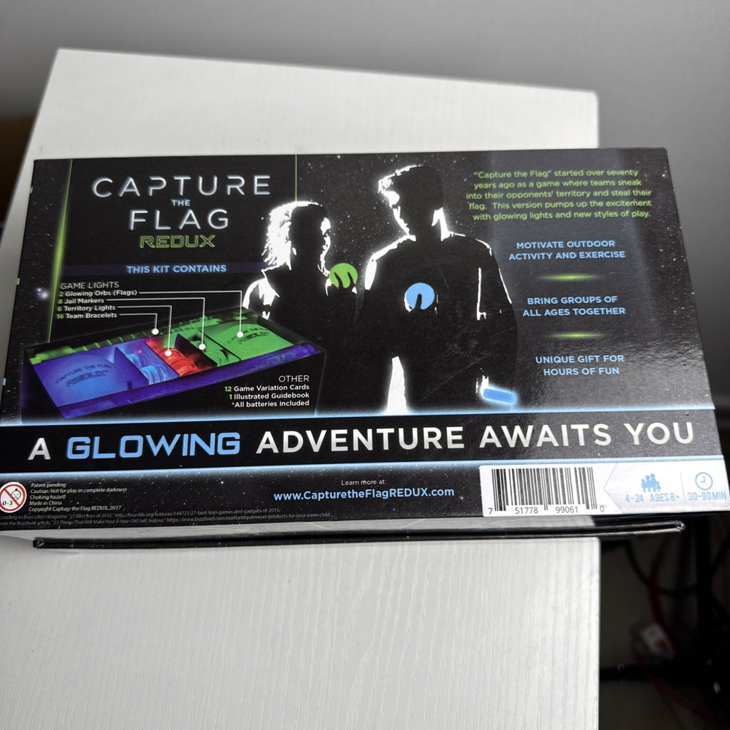 Capture the Flag Redux outdoor LED lawn game set with glowing orbs and box.