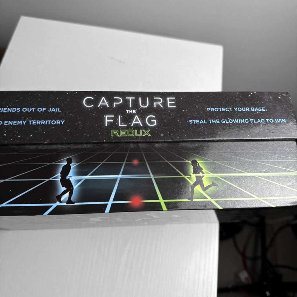 Capture the Flag Redux outdoor LED lawn game set with glowing orbs and box.