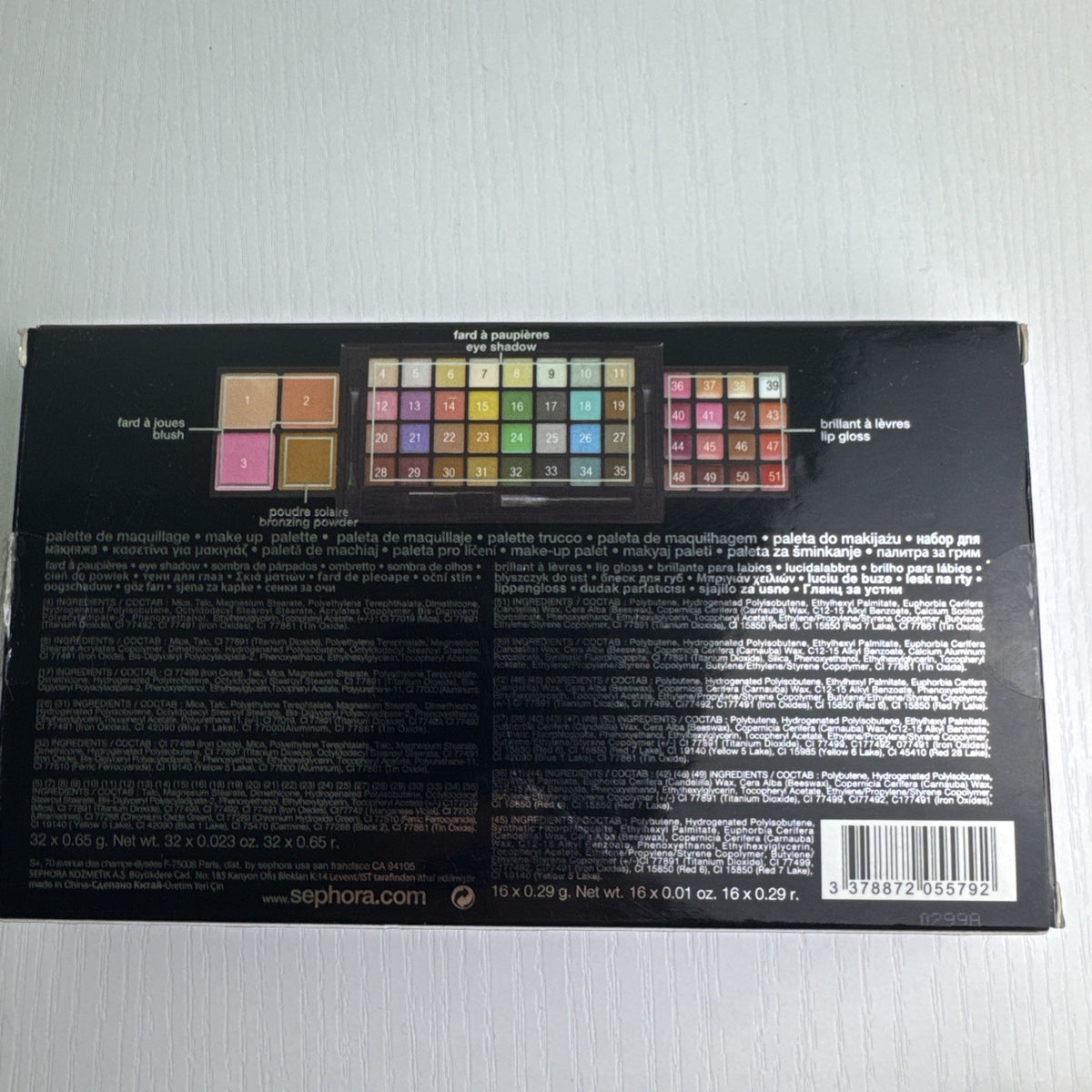 Sephora fold-out multi-tier makeup color palette showing eyeshadows, lip glosses, and face powders in slipcase box.