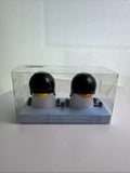 Pier 1 wind-up rolling penguin salt and pepper shakers set in black and white plastic
