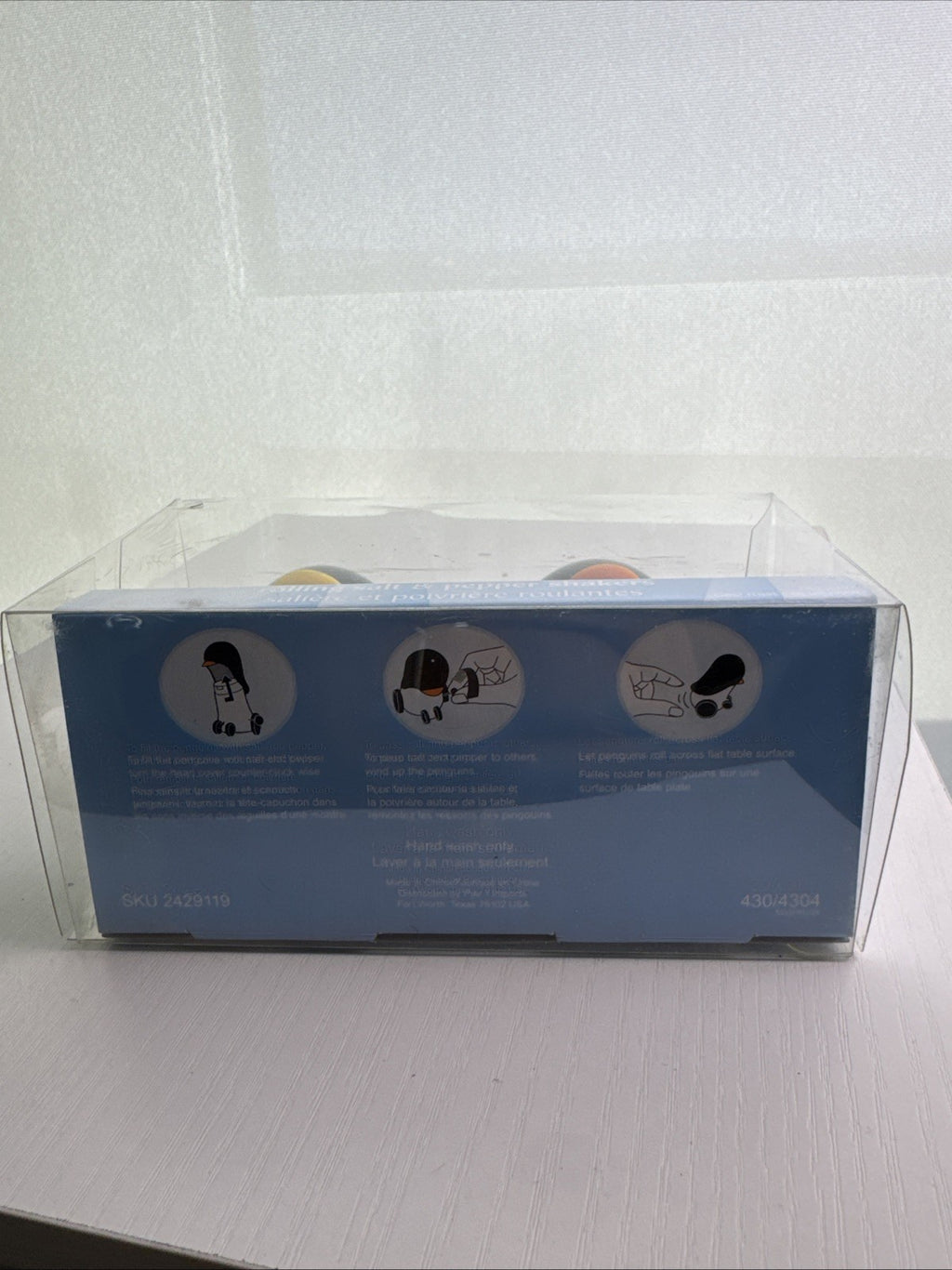 Pier 1 wind-up rolling penguin salt and pepper shakers set in black and white plastic