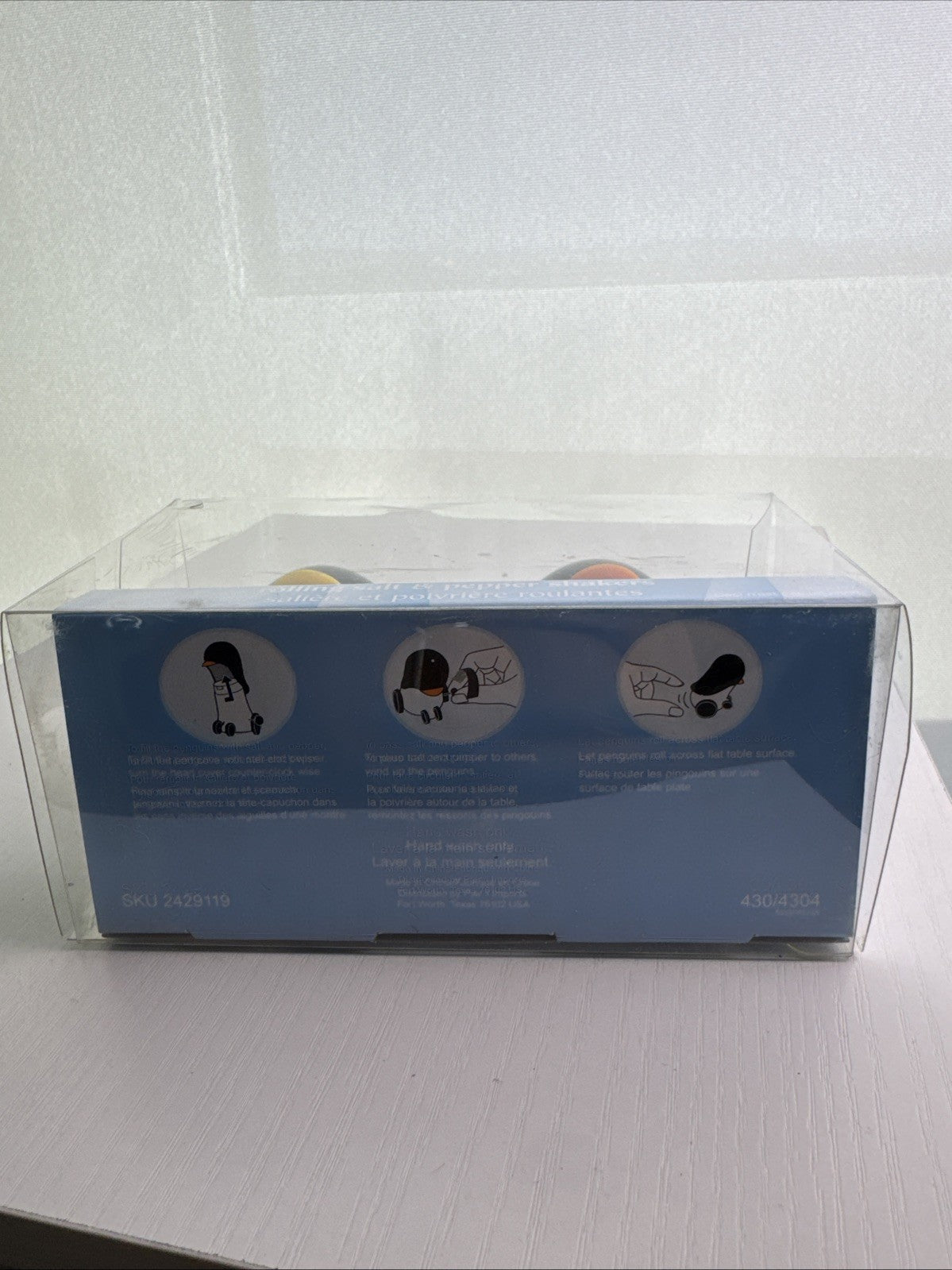 Pier 1 wind-up rolling penguin salt and pepper shakers set in black and white plastic