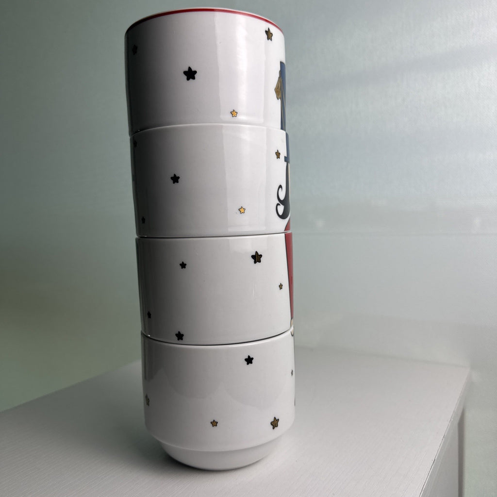 The Cellar stacked porcelain Nutcracker coffee mugs, set of 4 with holiday uniform design