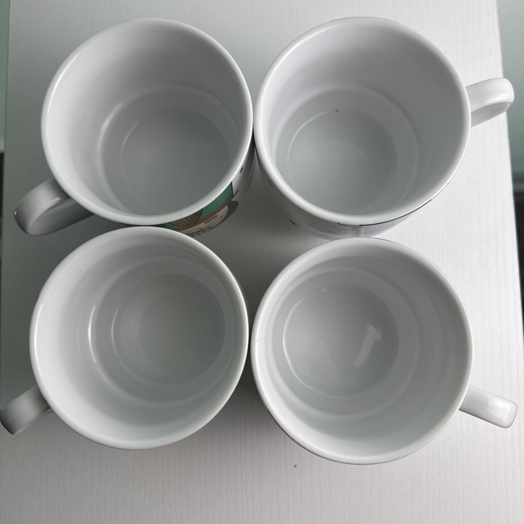 The Cellar stacked porcelain Nutcracker coffee mugs, set of 4 with holiday uniform design