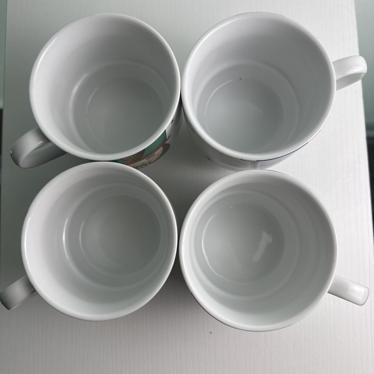 The Cellar stacked porcelain Nutcracker coffee mugs, set of 4 with holiday uniform design