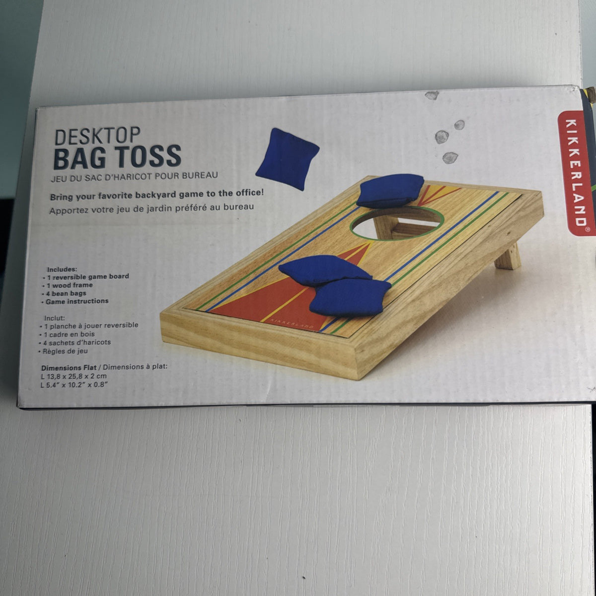 Kikkerland desktop mini cornhole wooden board game with reversible target and blue toss bags