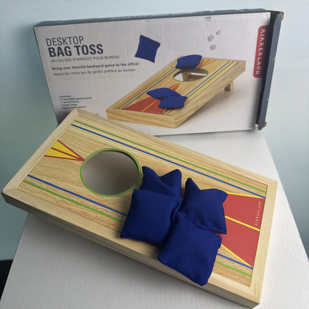 Kikkerland desktop mini cornhole wooden board game with reversible target and blue toss bags