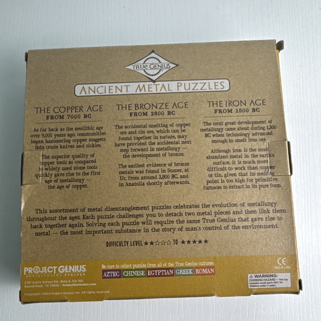 True Genius Ancient Metal Puzzles 12-piece wire brain teaser set in original packaging