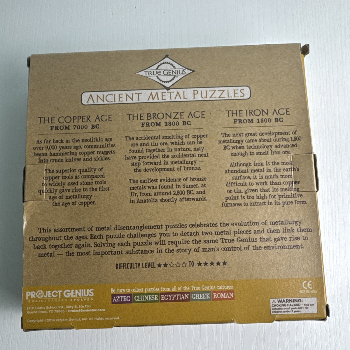True Genius Ancient Metal Puzzles 12-piece wire brain teaser set in original packaging