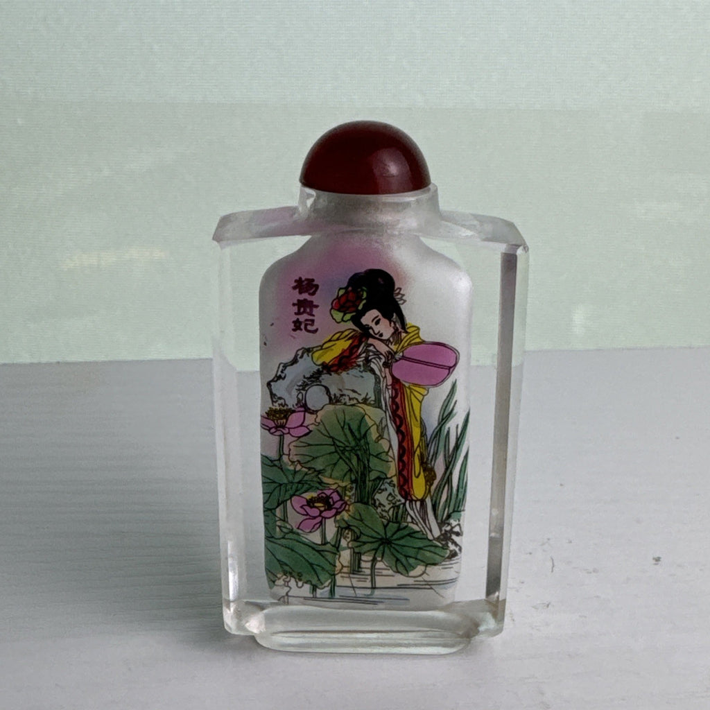 Vintage Chinese inside-painted faceted crystal snuff bottle featuring Yang Guifei with red stopper