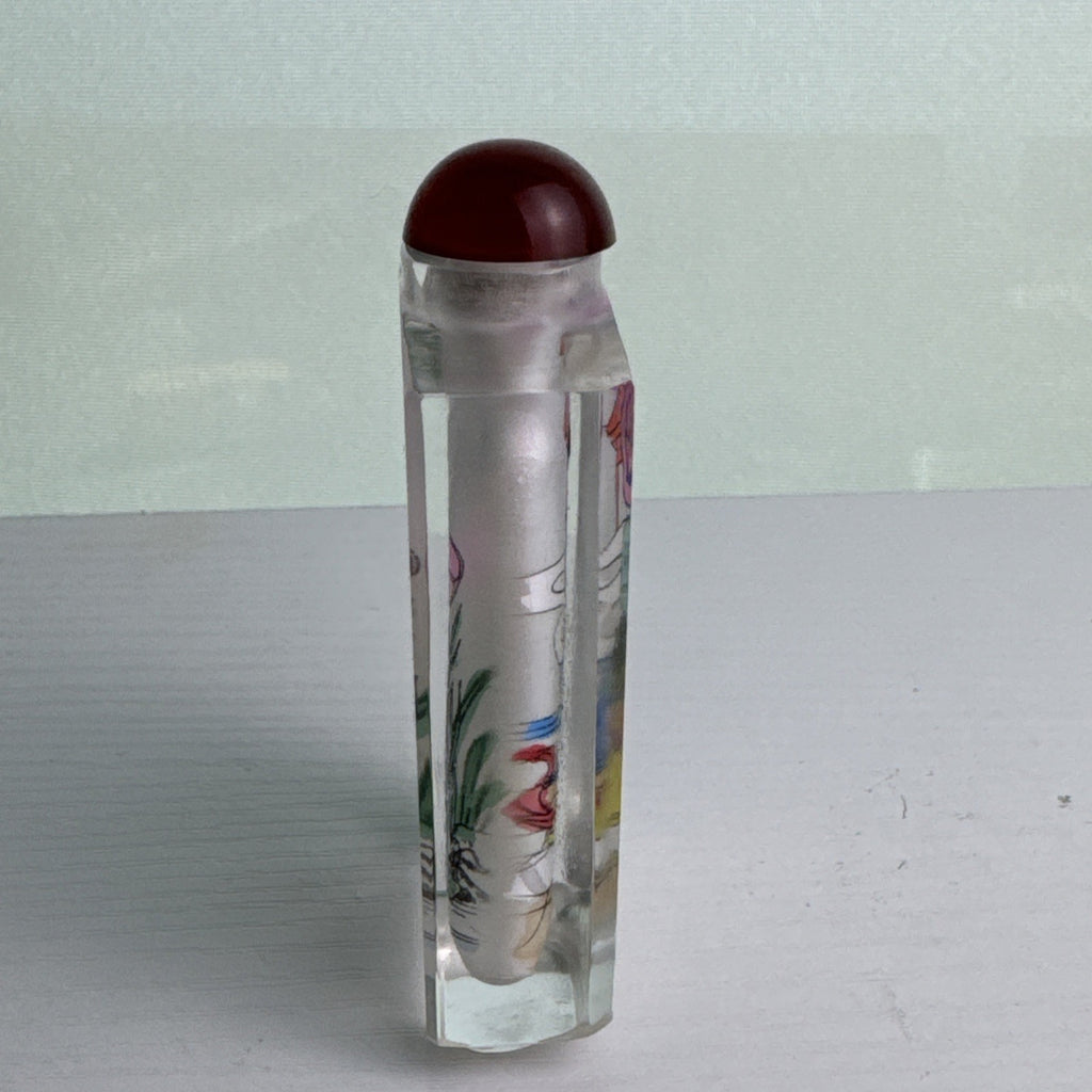 Vintage Chinese inside-painted faceted crystal snuff bottle featuring Yang Guifei with red stopper