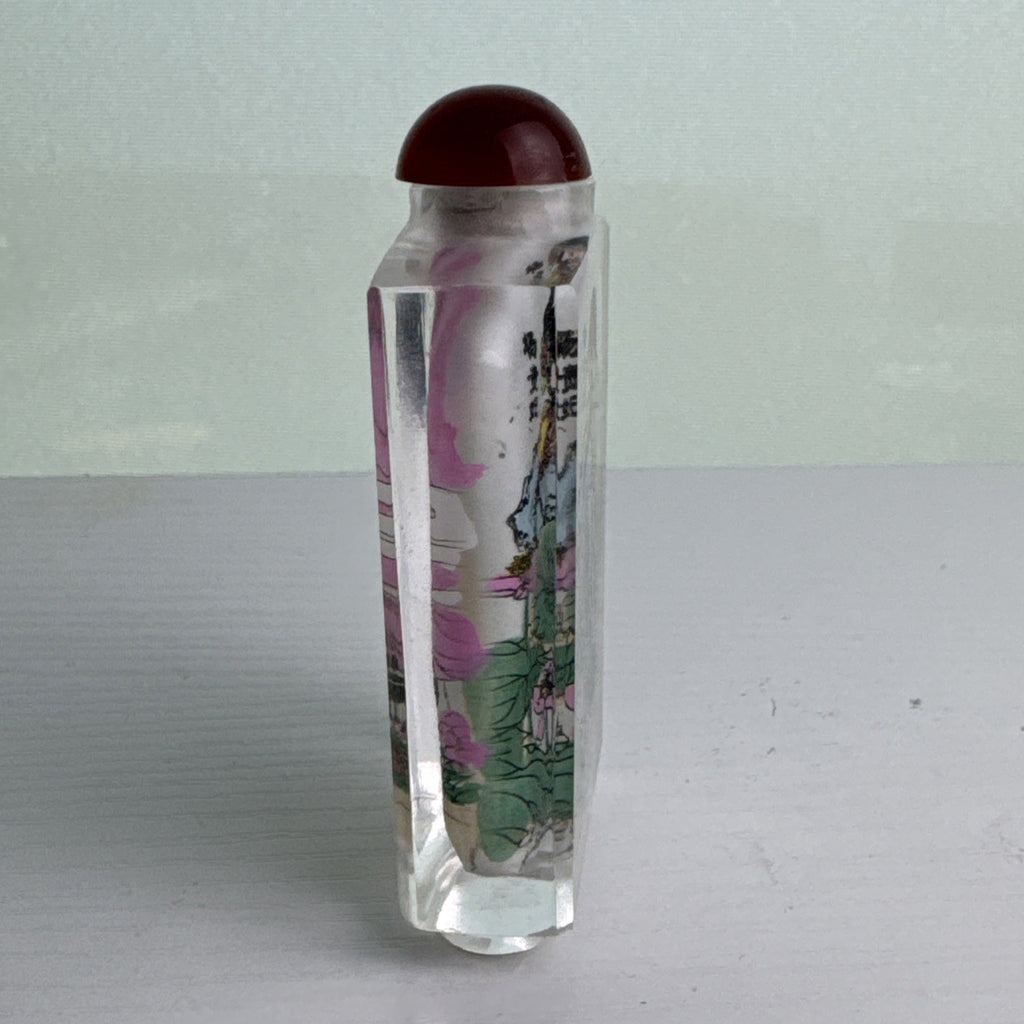Vintage Chinese inside-painted faceted crystal snuff bottle featuring Yang Guifei with red stopper