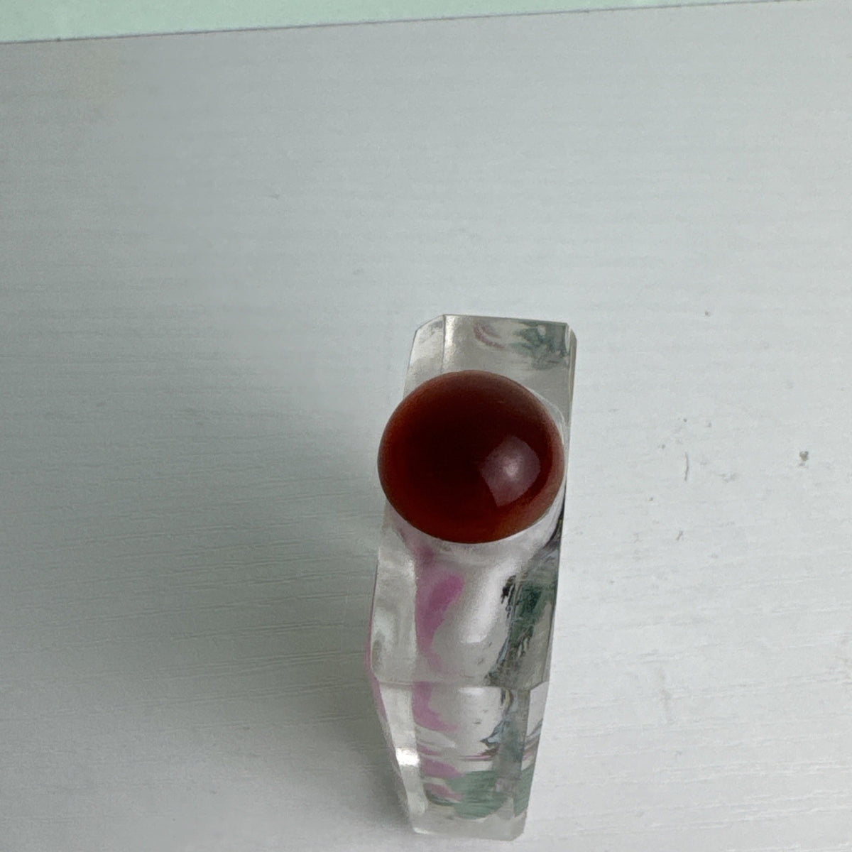 Vintage Chinese inside-painted faceted crystal snuff bottle featuring Yang Guifei with red stopper