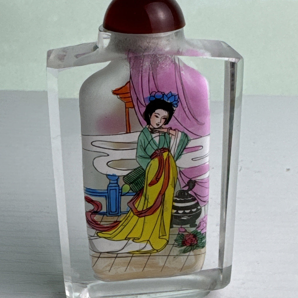 Vintage Chinese inside-painted faceted crystal snuff bottle featuring Yang Guifei with red stopper
