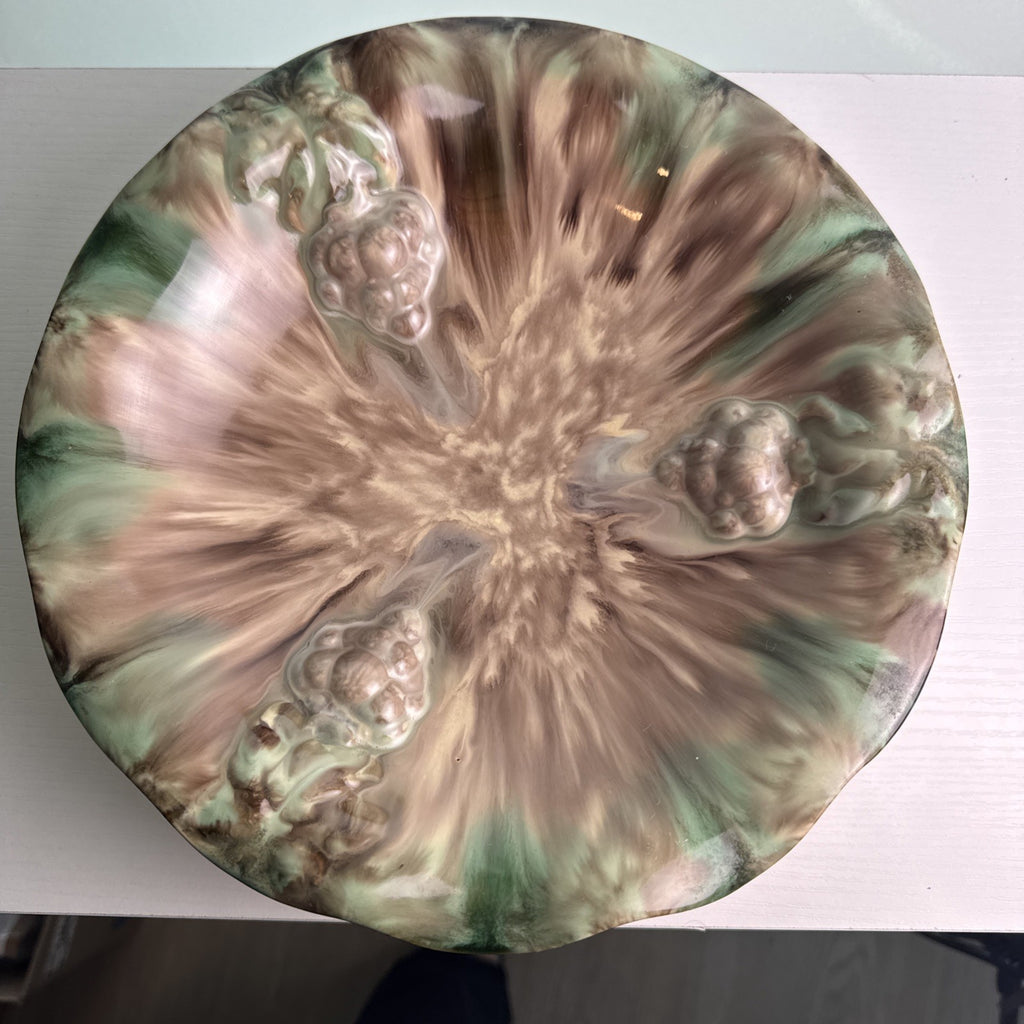 Vintage 1950s Jasba Keramik majolica ceramic footed bowl with embossed grape clusters and glossy drip glaze.