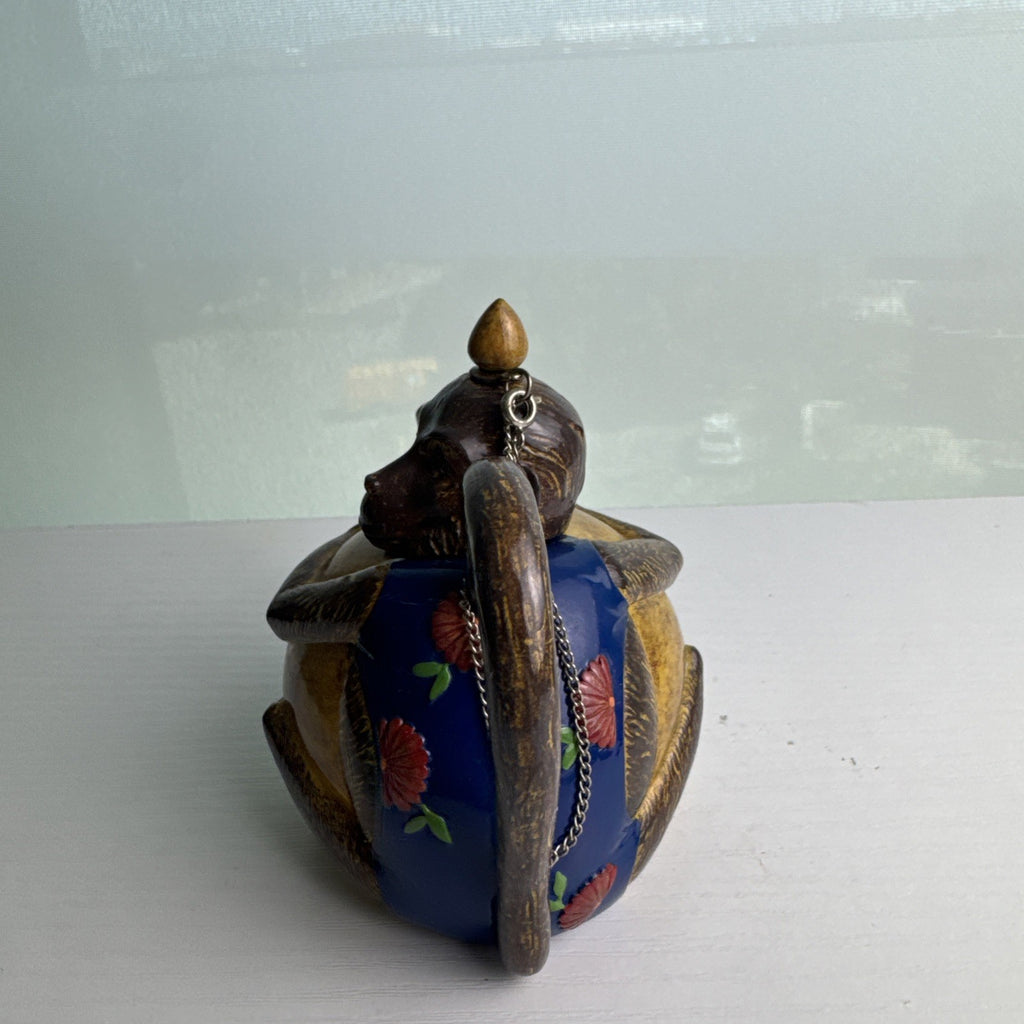 Hand-painted ceramic miniature monkey novelty teapot with bamboo-style spout and chained lid