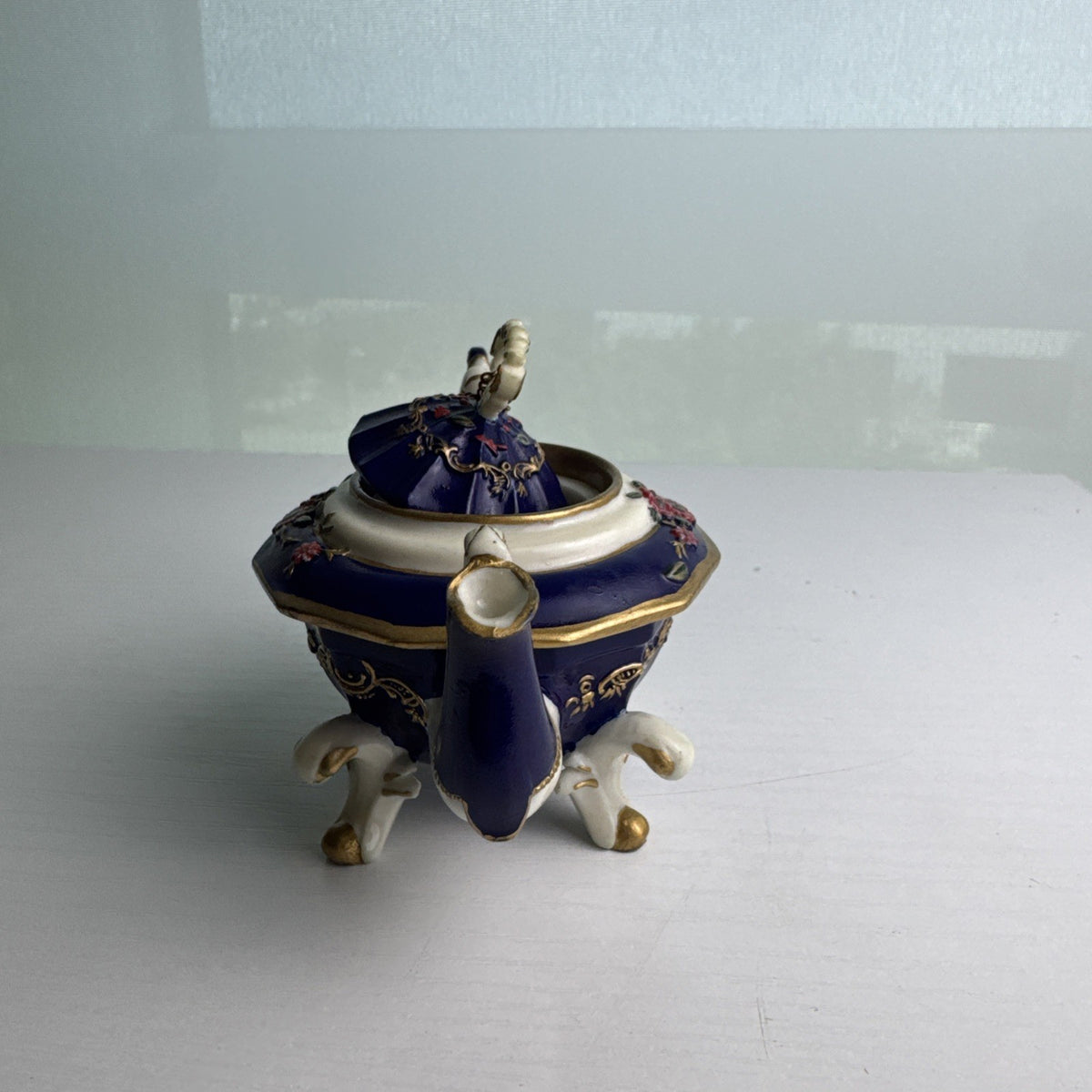 Nini Sahiba cobalt blue resin miniature teapot trinket box with hand-painted 3D floral accents