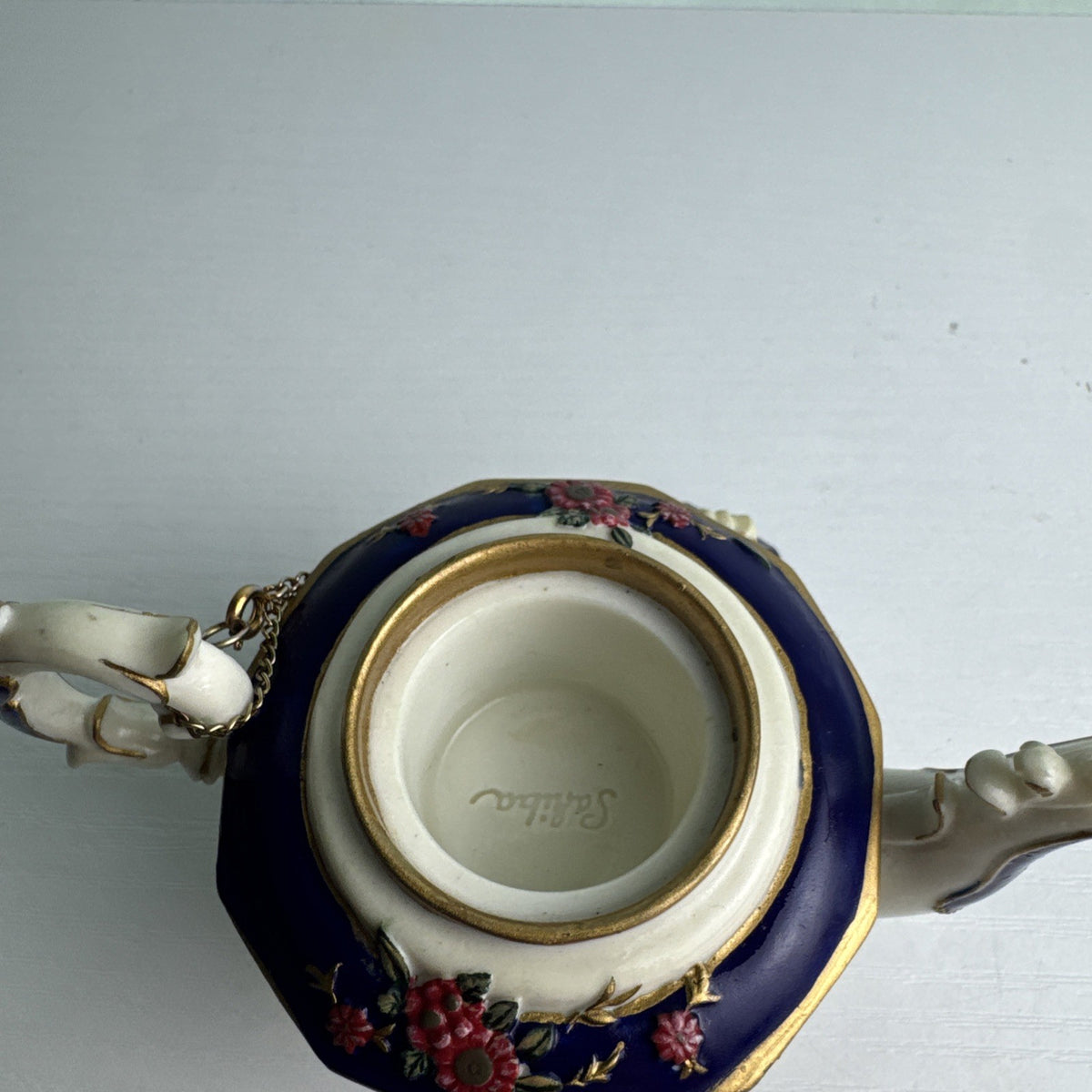 Nini Sahiba cobalt blue resin miniature teapot trinket box with hand-painted 3D floral accents