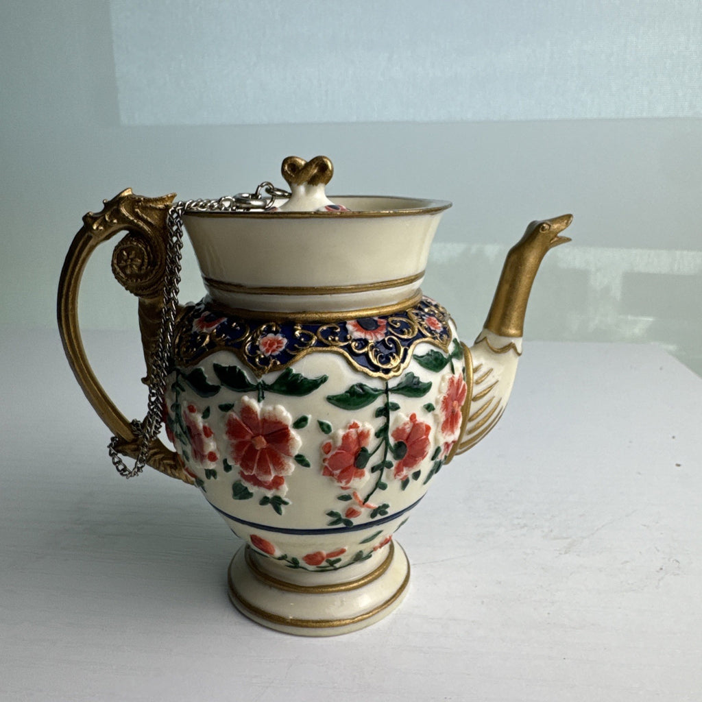 NINI miniature porcelain floral urn teapot with dragon handle and chained lid