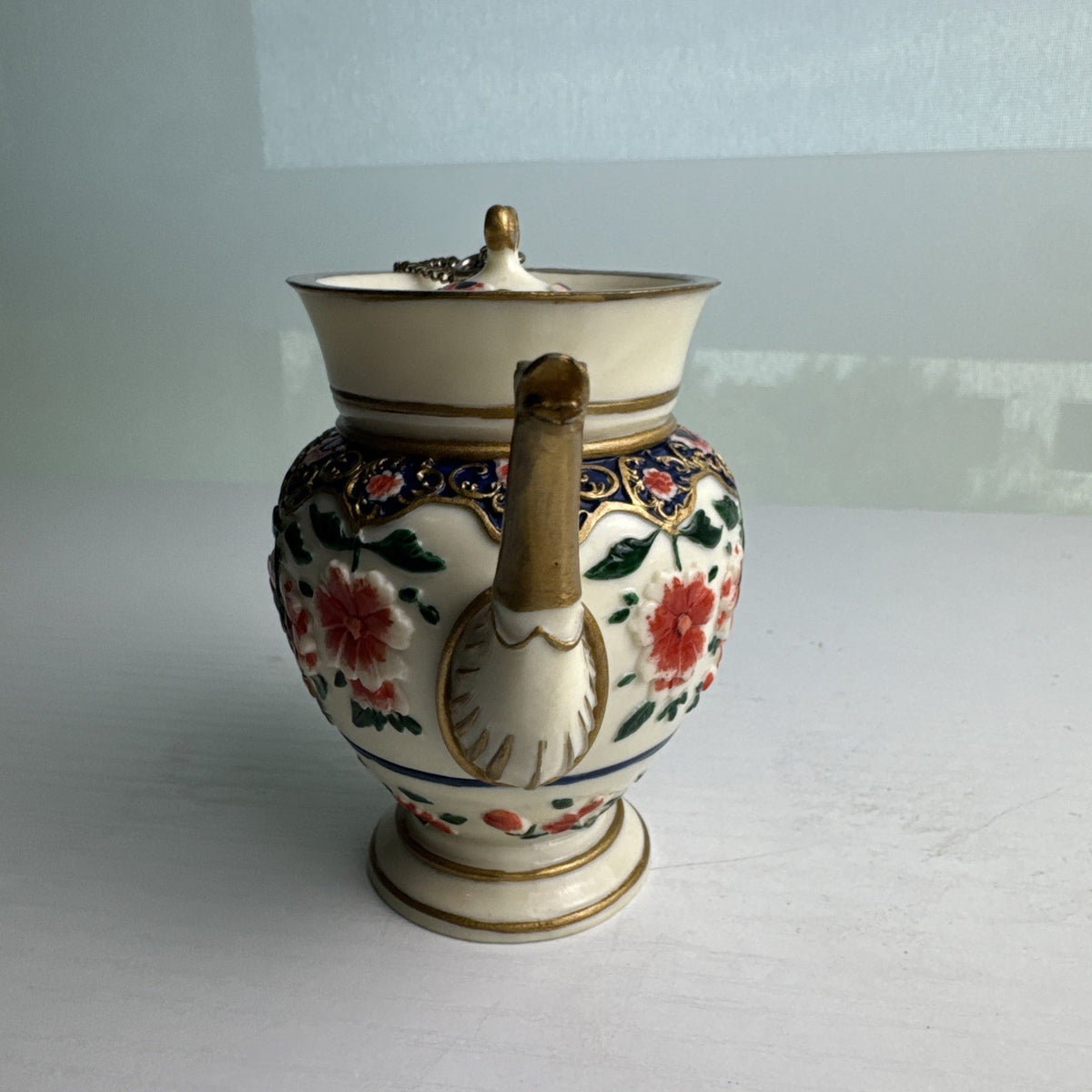 NINI miniature porcelain floral urn teapot with dragon handle and chained lid