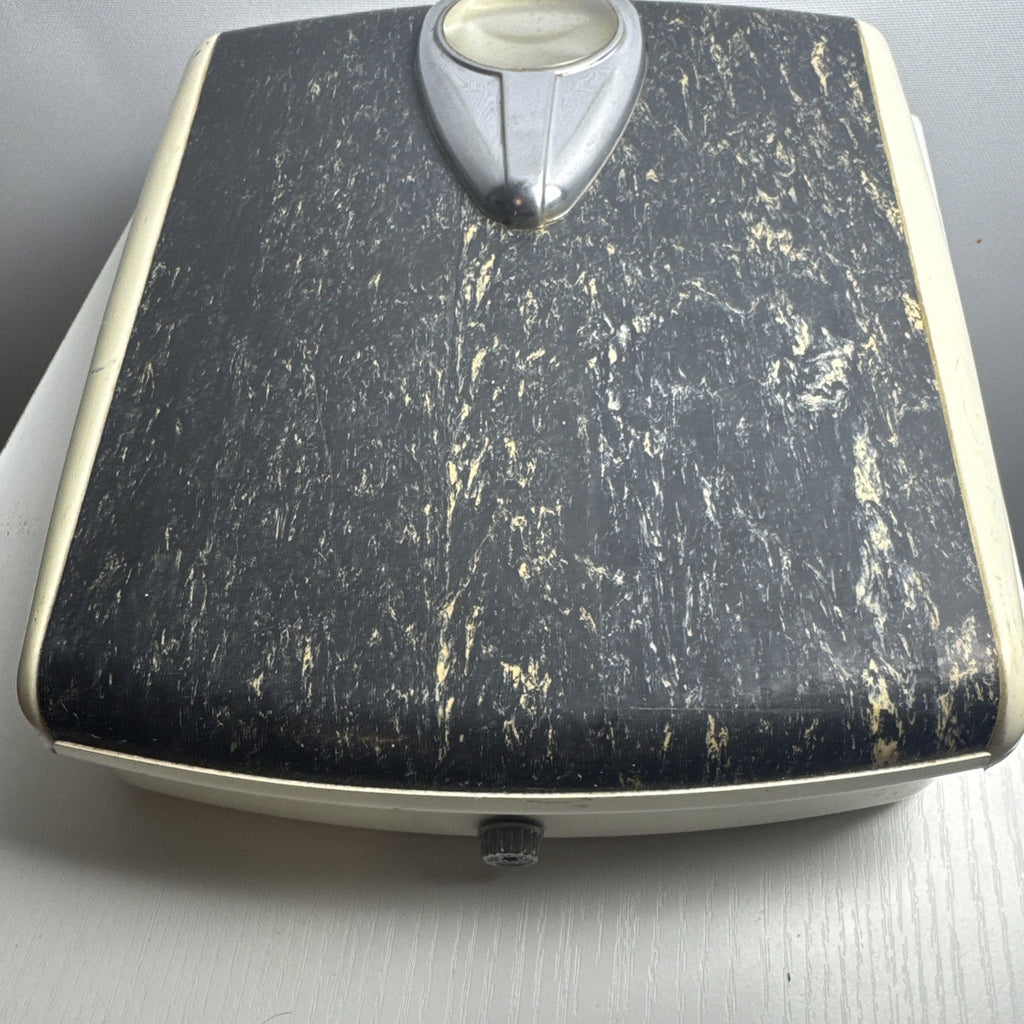 1950s Borg mechanical bathroom scale with chrome teardrop dial and black marbled platform