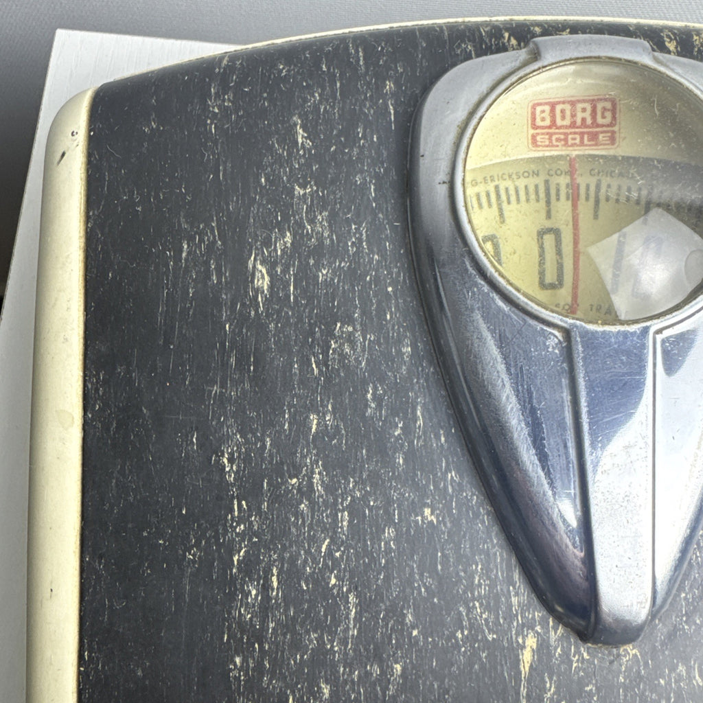 1950s Borg mechanical bathroom scale with chrome teardrop dial and black marbled platform