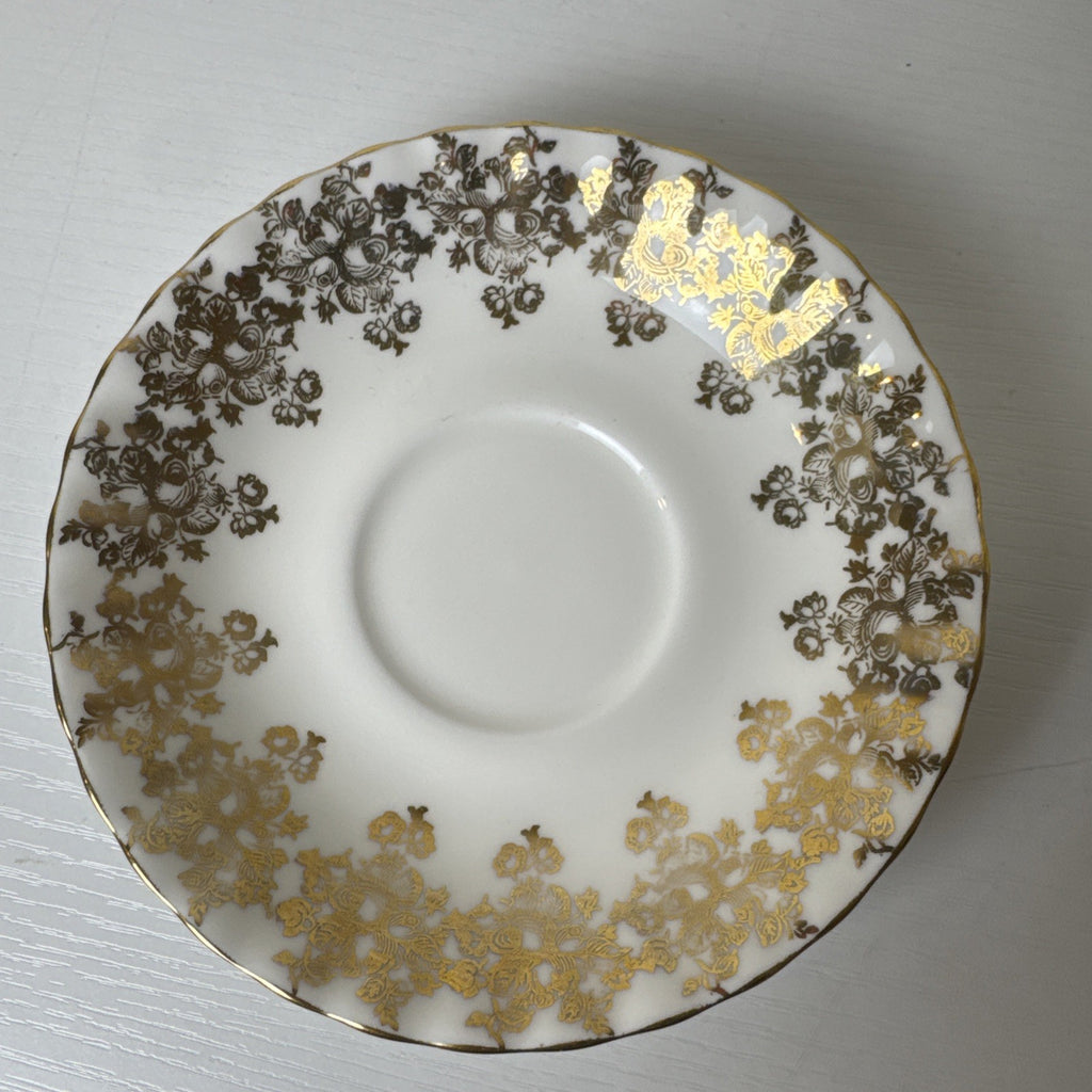Royal Albert 50th anniversary gold and white fine porcelain teacup and saucer set made in the UK