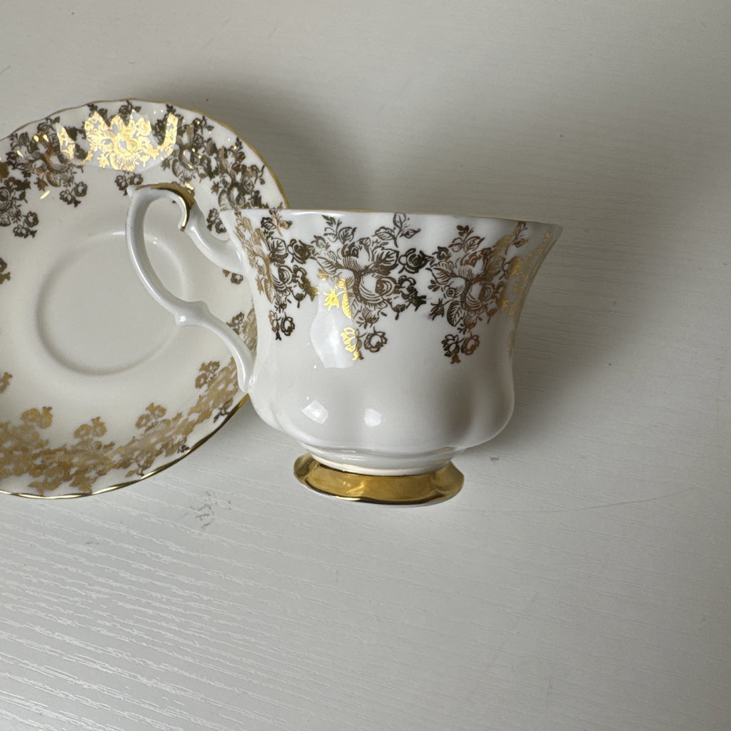 Royal Albert 50th anniversary gold and white fine porcelain teacup and saucer set made in the UK