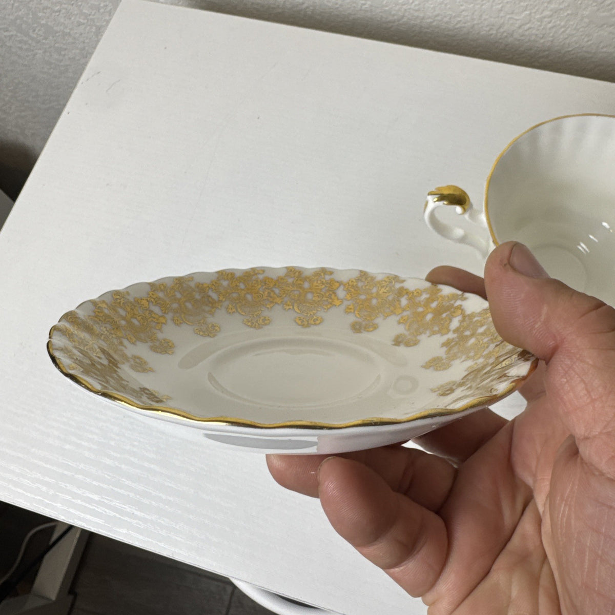 Royal Albert 50th anniversary gold and white fine porcelain teacup and saucer set made in the UK