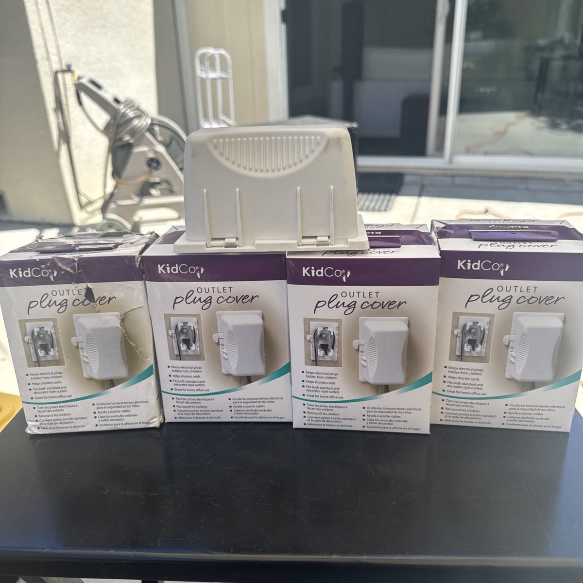 Set of 5 white KidCo S211 outlet plug covers and electrical cord shorteners for child safety baby proofing