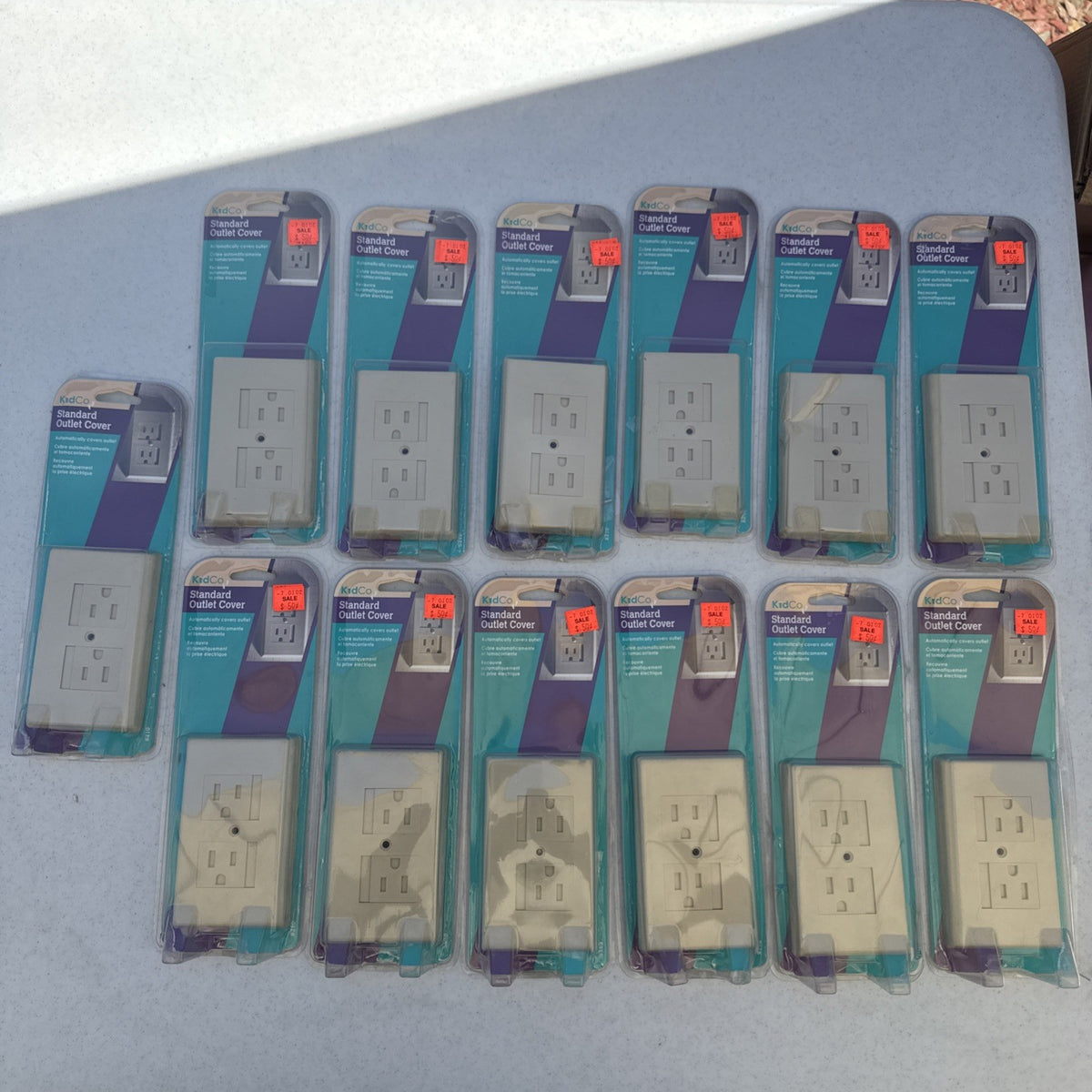 Set of 13 KidCo beige auto-closing safety outlet covers model S210 in open box packaging