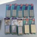 Lot of 10 packaged KidCo auto-closing safety outlet covers in beige and white for standard and Decora outlets.
