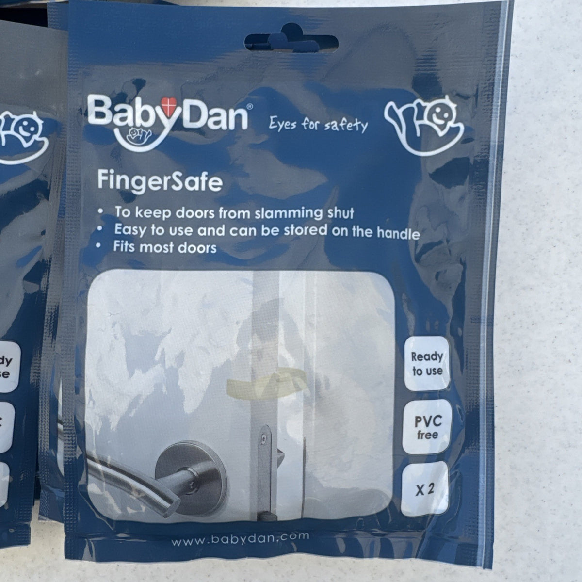 Bulk lot of 25 brand new packs of clear BabyDan FingerSafe door guards, total 50 stoppers.