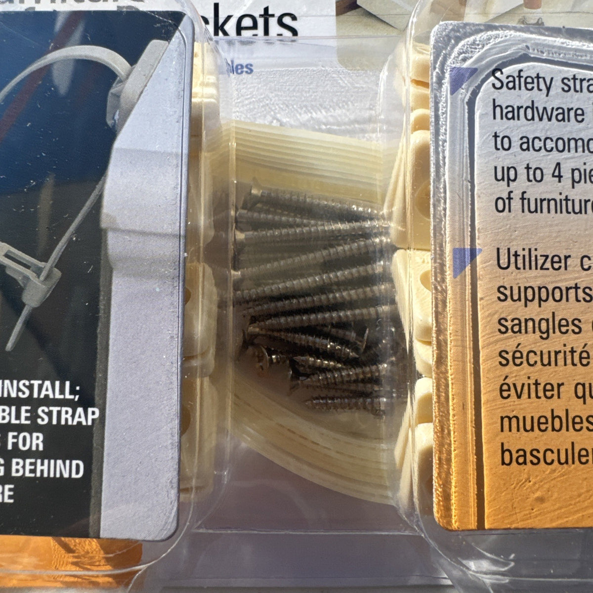 Three sealed packages of Mommy's Helper tip-resistant furniture safety brackets model 02263.