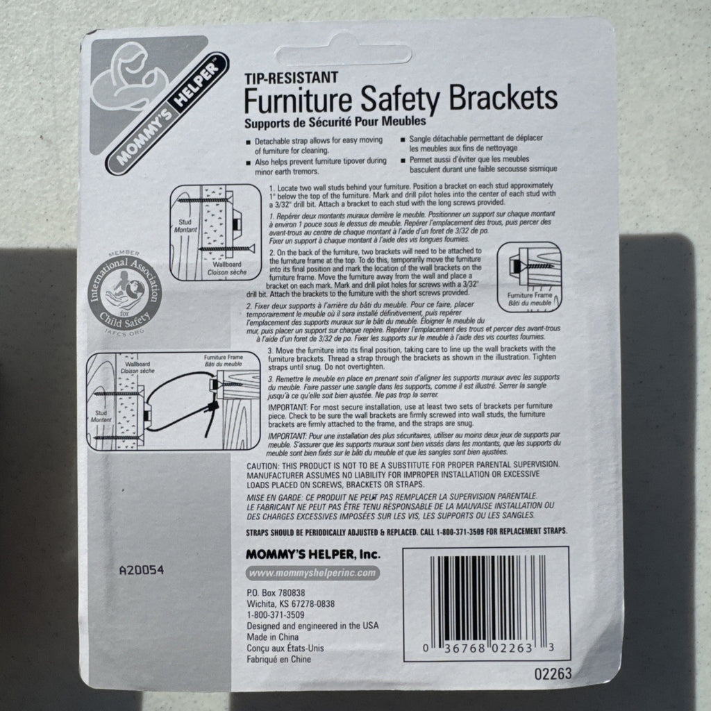 Three sealed packages of Mommy's Helper tip-resistant furniture safety brackets model 02263.
