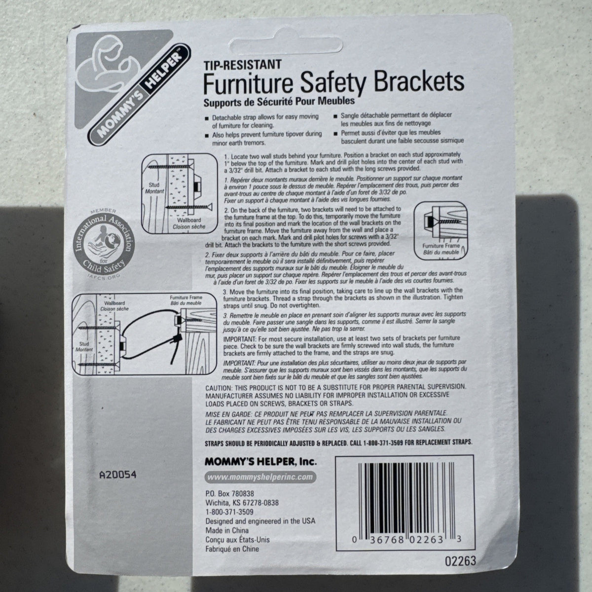 Three sealed packages of Mommy's Helper tip-resistant furniture safety brackets model 02263.